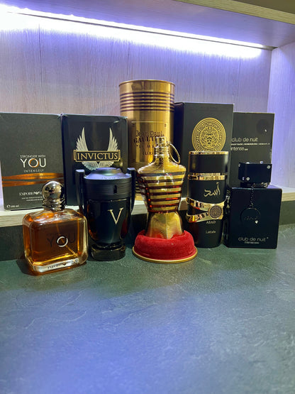 5 PERFUMES + 1 OBSEQUIO ( Club de Nuit + Invictus Victory + Asad + Stroguer Intensly + JPG Elixir + 1 Perfumero )