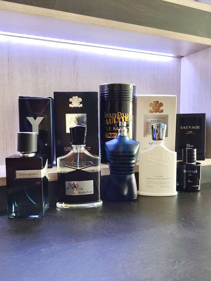 5 PERFUMES + 1 OBSEQUIO ( Y YSL + JPG le male + creed aventus + creed mountain water + sauvage elixir + 1 Perfumero )